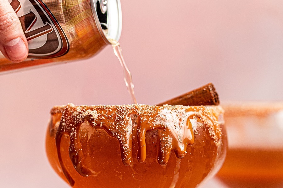 Pumpkin Spice Mocktail Close Up of Cream Soda Being Poured into Mocktail